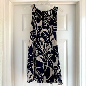 Satin cream and black sleeveless dress